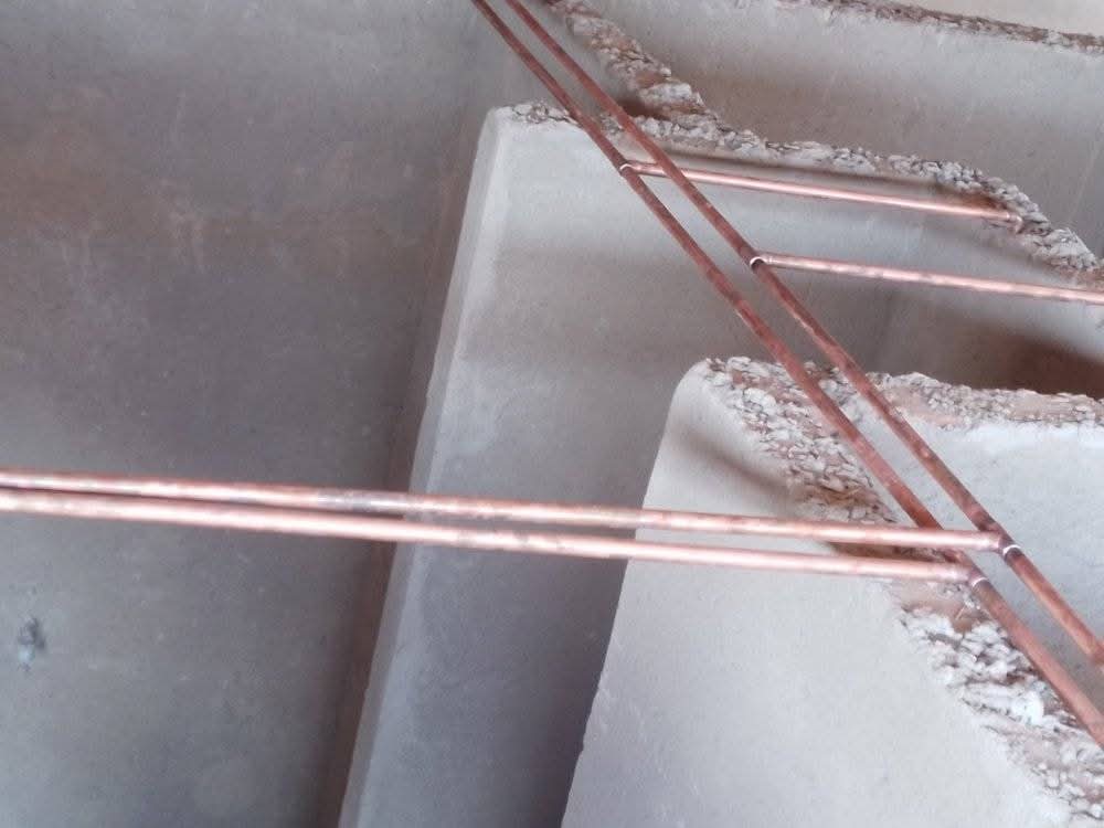 Copper water pipes installed in a ceiling