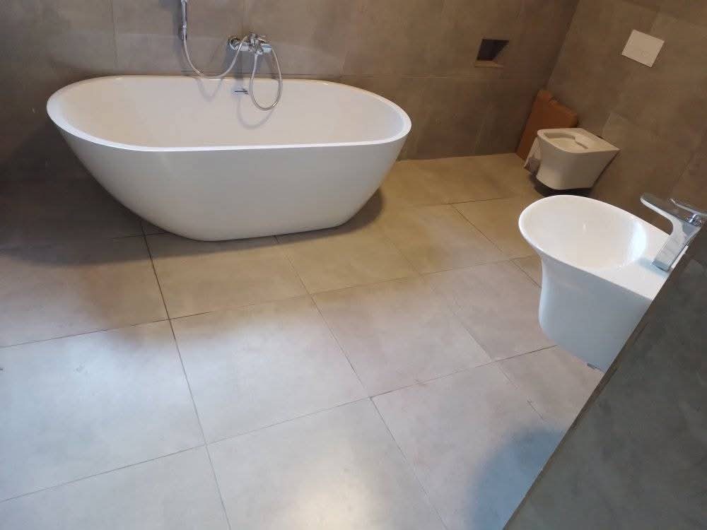 Finished bathroom with a freestanding bath
